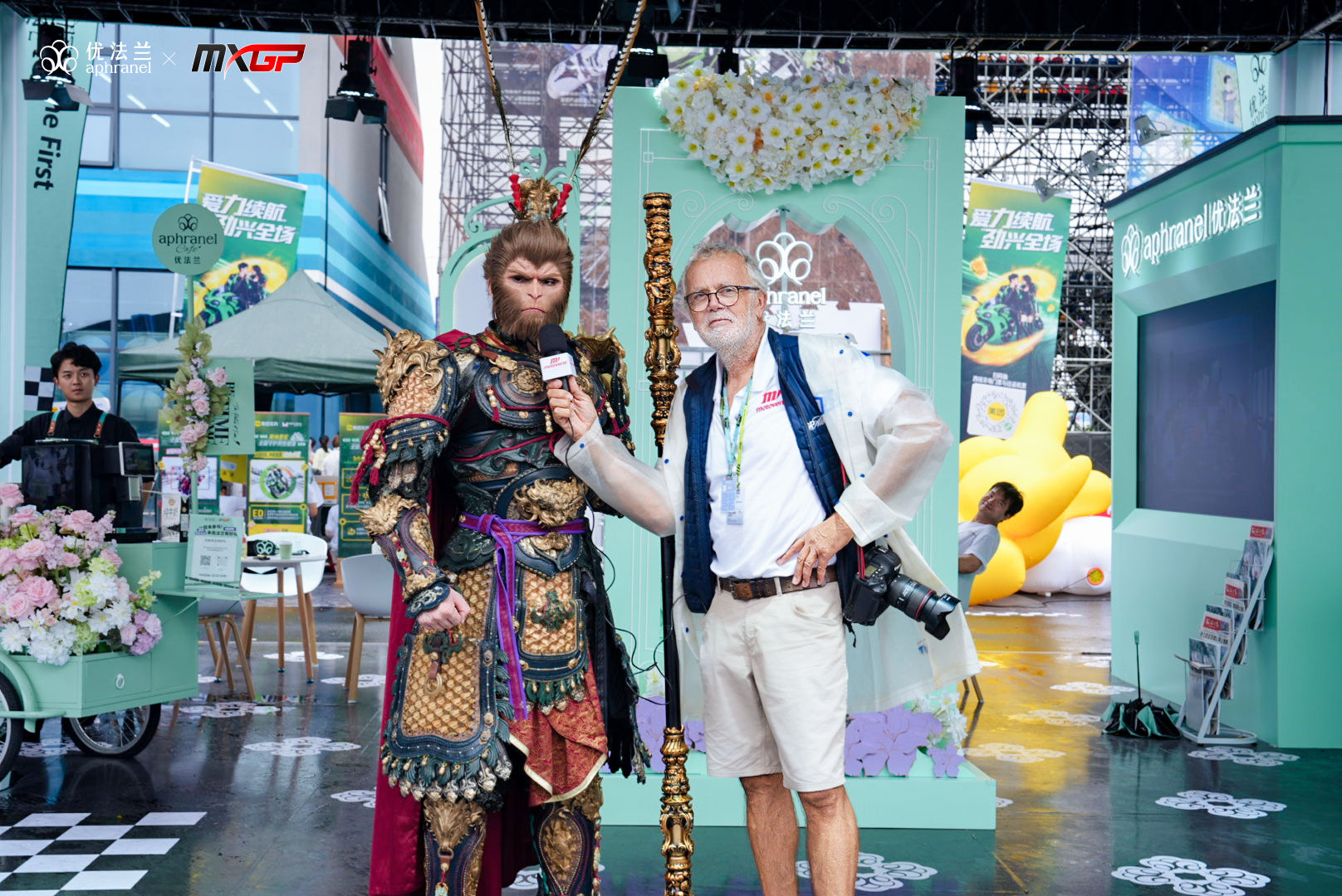 Guests pose at the Aphranel booth at MXGP Shanghai.